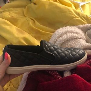 Black Steve Madden slip-ons